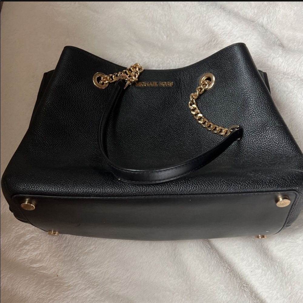 A Black Leather Michael Kors Handbag